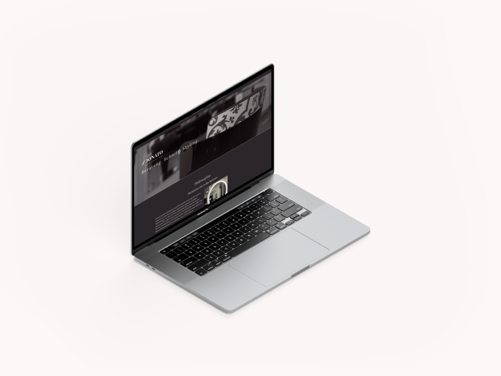MacBook mit Mockup der Website von Donato
